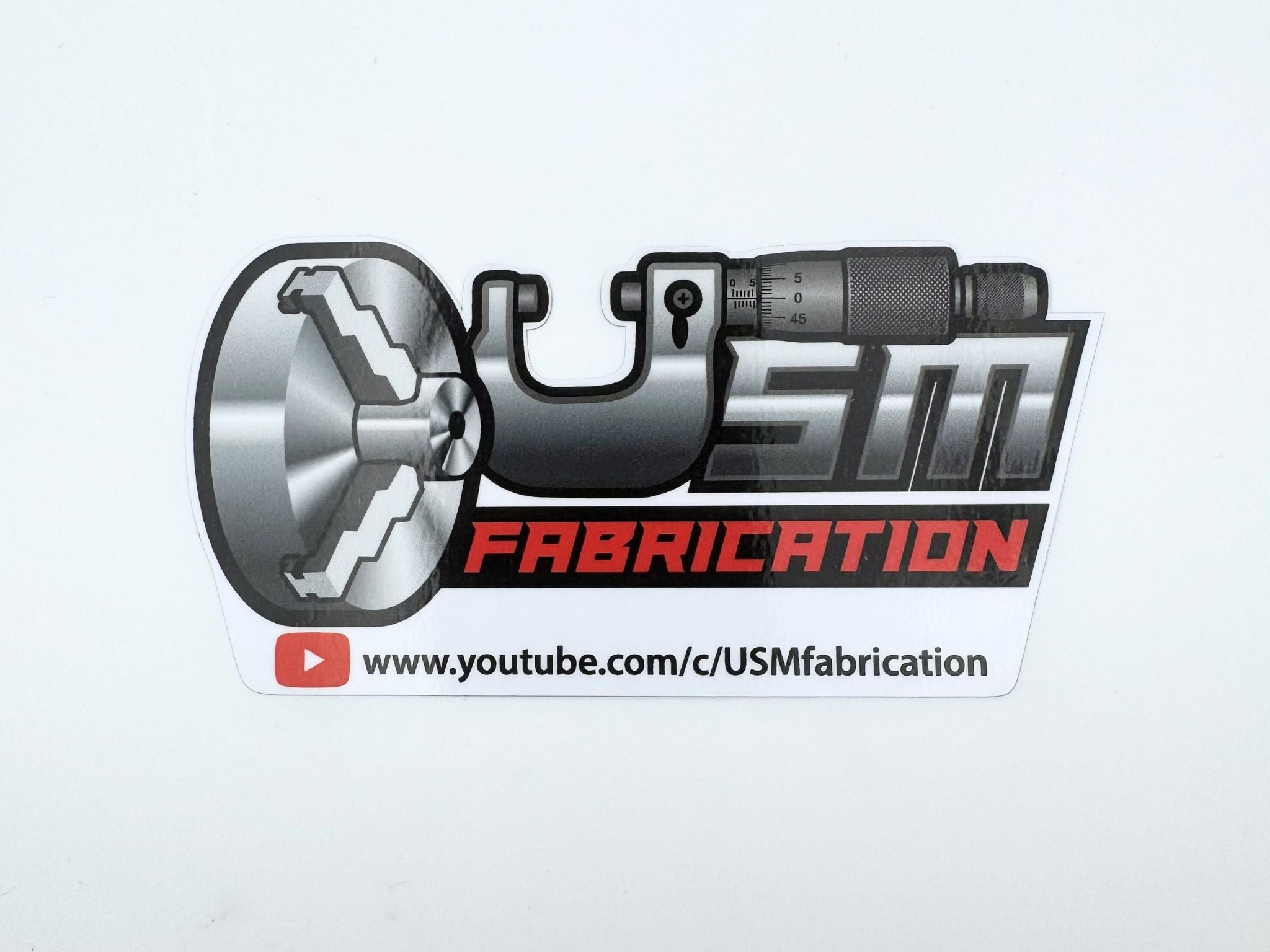 Le sticker USMfabrication™ USMfabrication