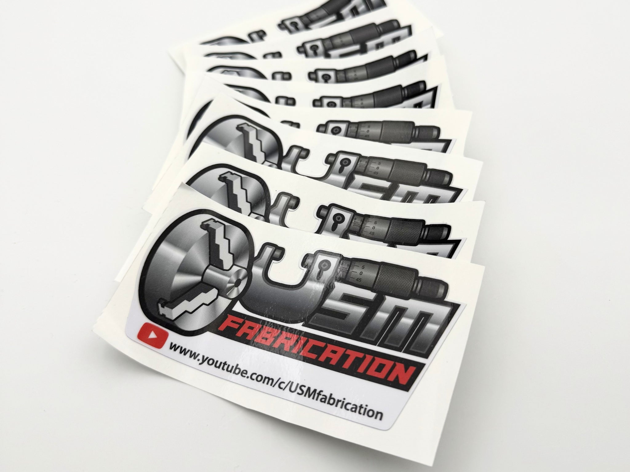 Le sticker USMfabrication™ USMfabrication